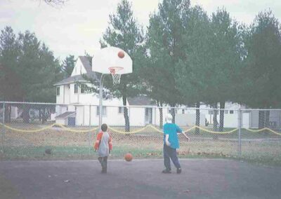 Kids play basketball